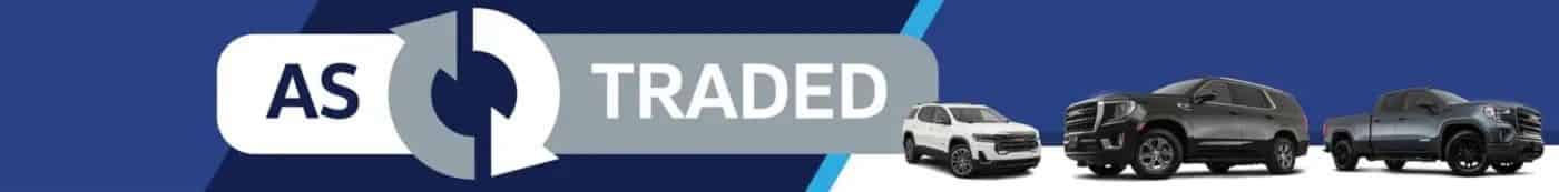 A banner with the text AS TRADED flanked by a circular arrow graphic. The background is blue and gray.