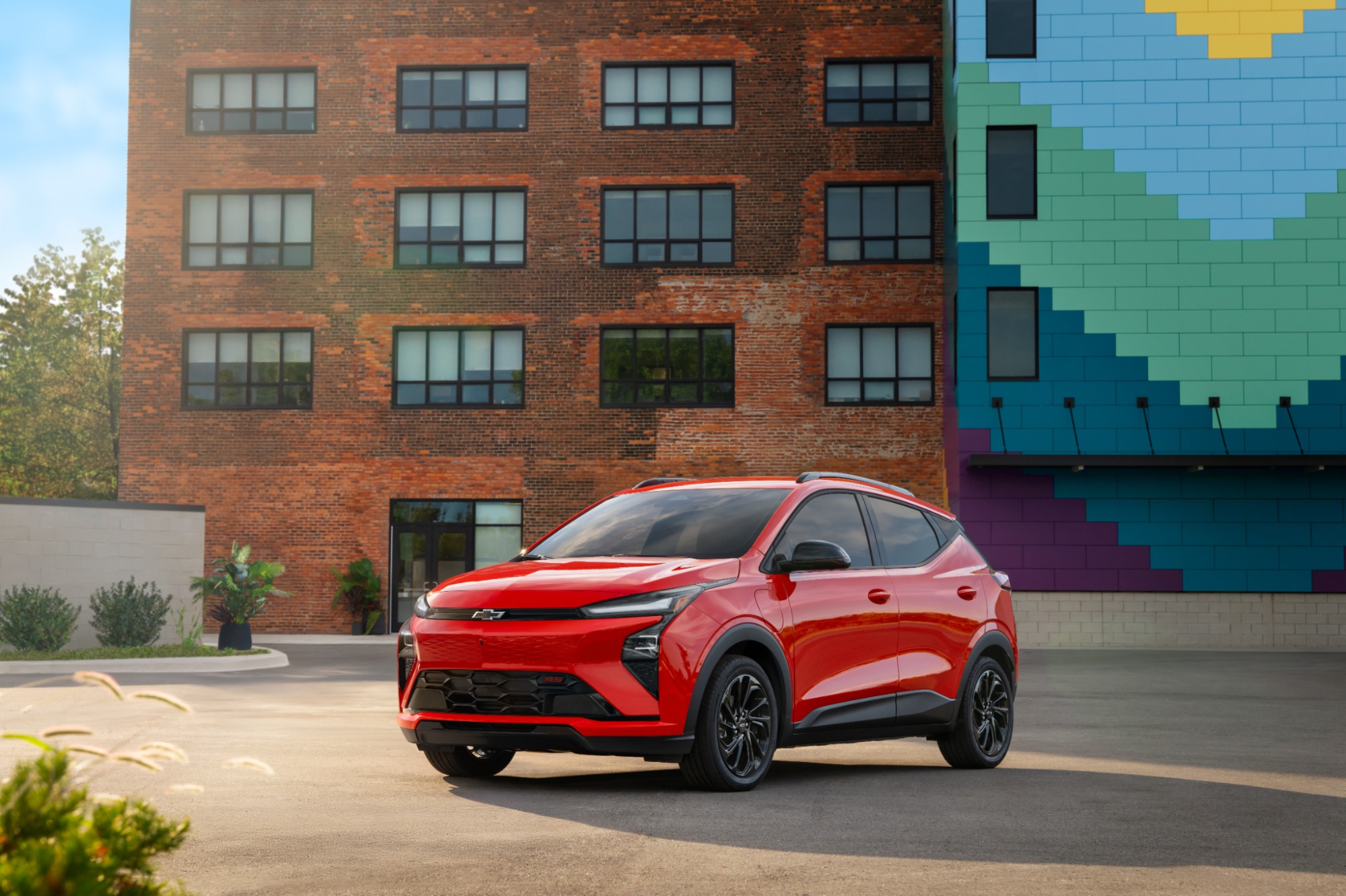 Red Chevrolet Bolt front exterior